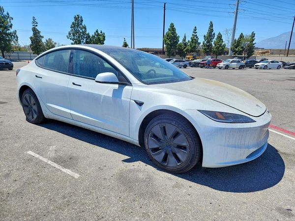 2025 TESLA MODEL 3 — Passenger 3/4