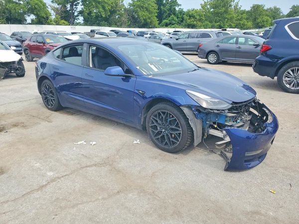 2023 TESLA MODEL 3 — Passenger 3/4