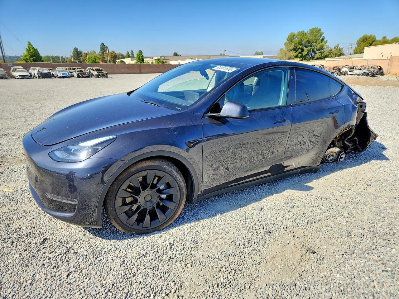 2024 TESLA MODEL Y — Front 3/4
