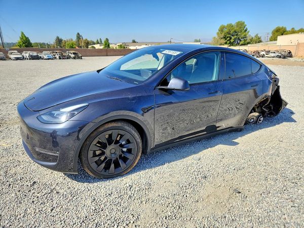 2024 TESLA MODEL Y — Front 3/4
