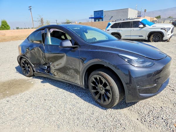 2024 TESLA MODEL Y — Passenger 3/4