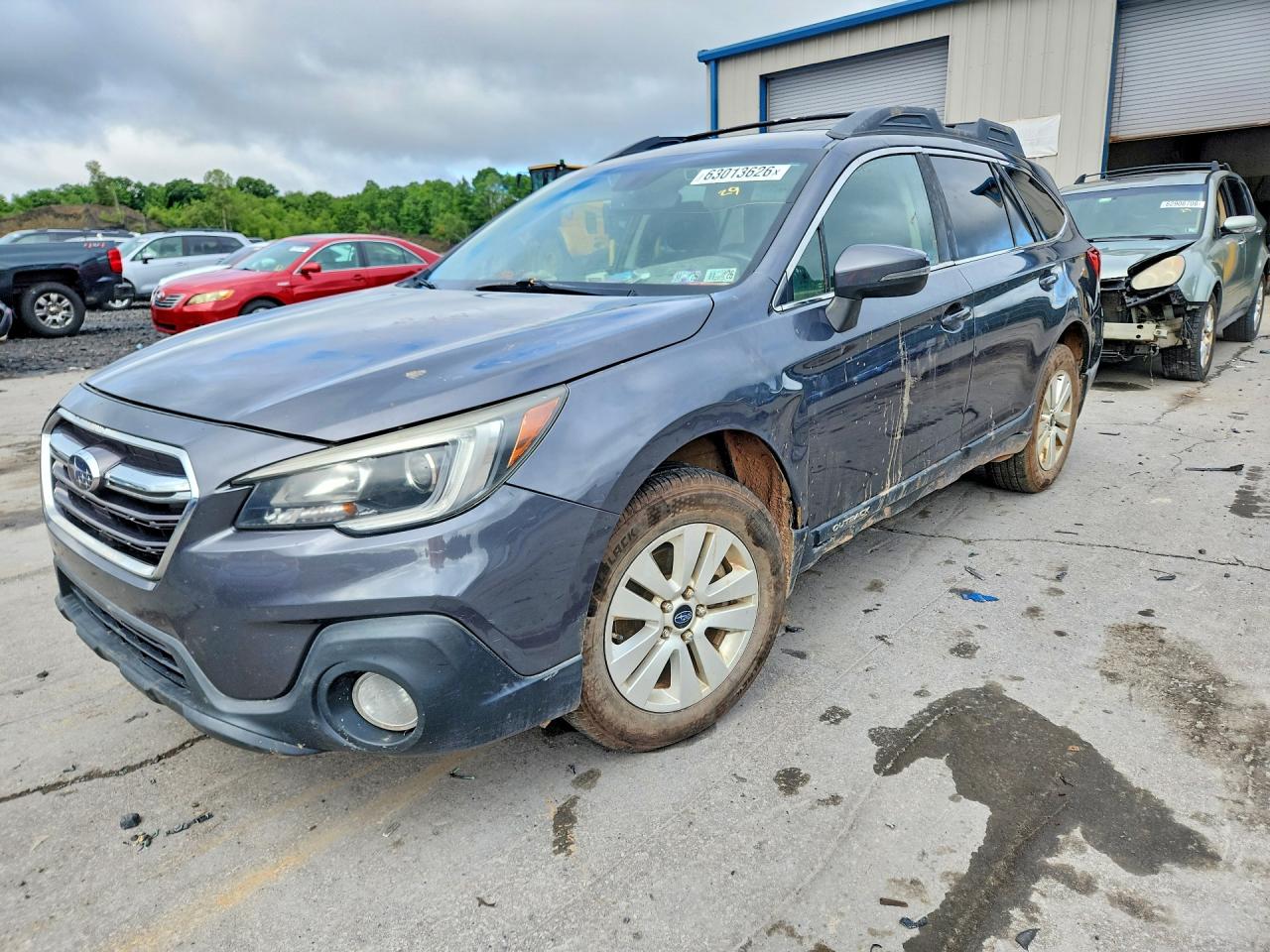 2019 SUBARU OUTBACK Premium+ES — Front 3/4