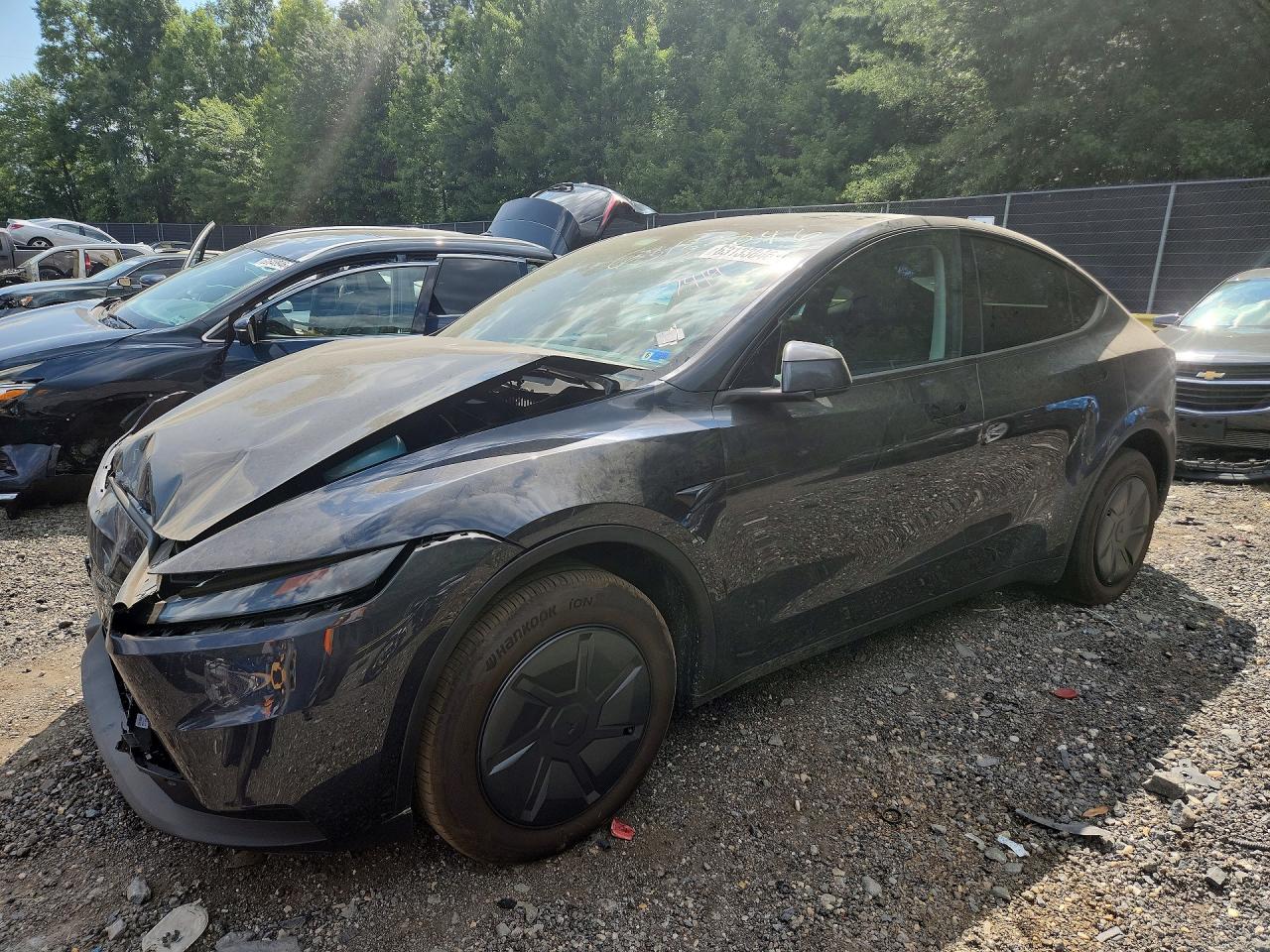 2026 TESLA MODEL Y — Front 3/4