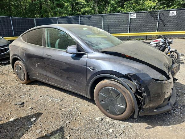 2026 TESLA MODEL Y — Passenger 3/4