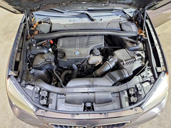 2013 BMW X1 sDrive28i — Engine bay