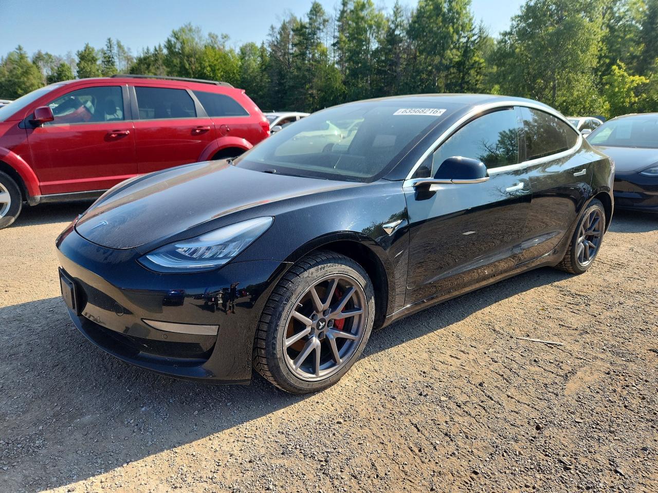 2020 TESLA MODEL 3 — Front 3/4