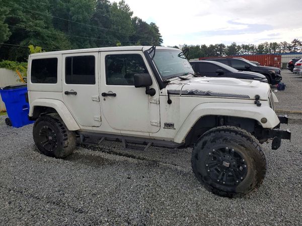 2014 JEEP WRANGLER Sahara — Passenger 3/4