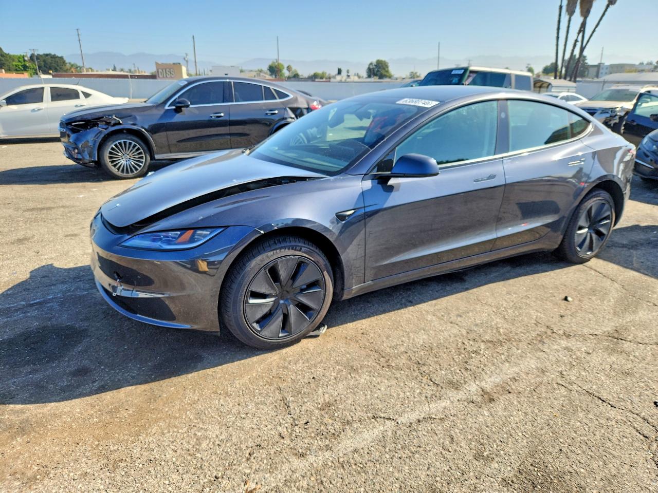 2025 TESLA MODEL 3 — Front 3/4