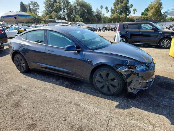 2025 TESLA MODEL 3 — Passenger 3/4
