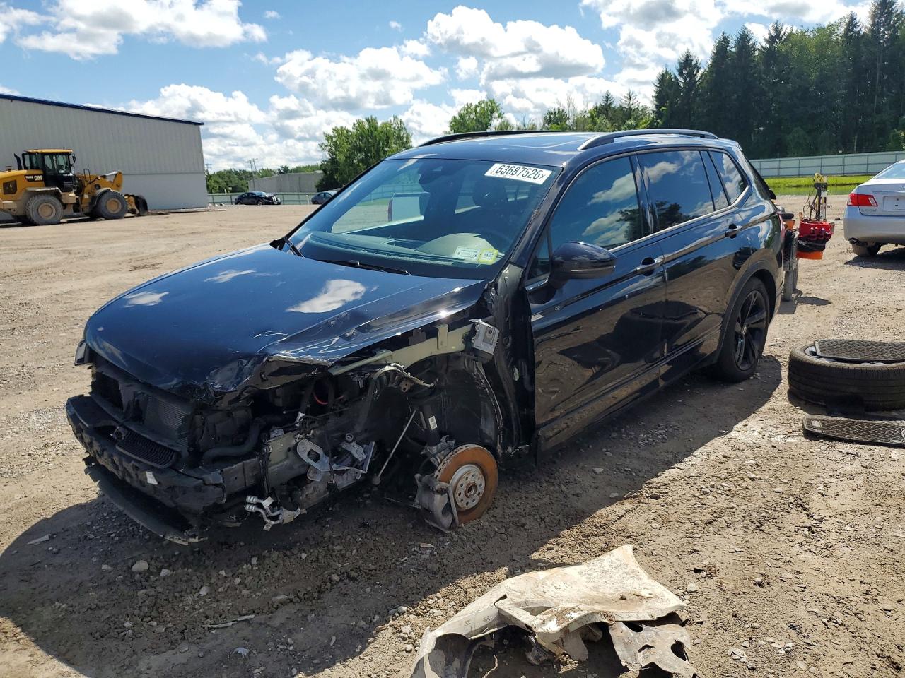 2024 VOLKSWAGEN TIGUAN 4Motion SE R-Line Black — Front 3/4