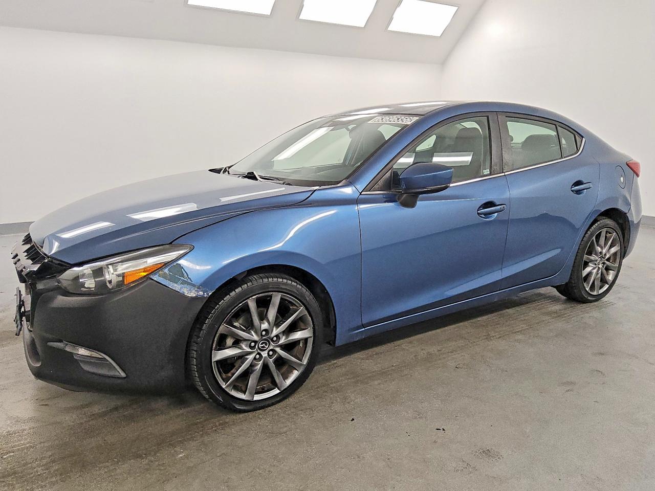 2018 MAZDA 3 Touring — Front 3/4