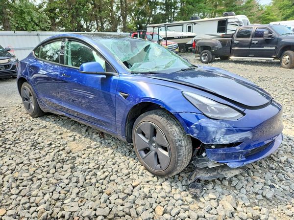 2023 TESLA MODEL 3 — Passenger 3/4