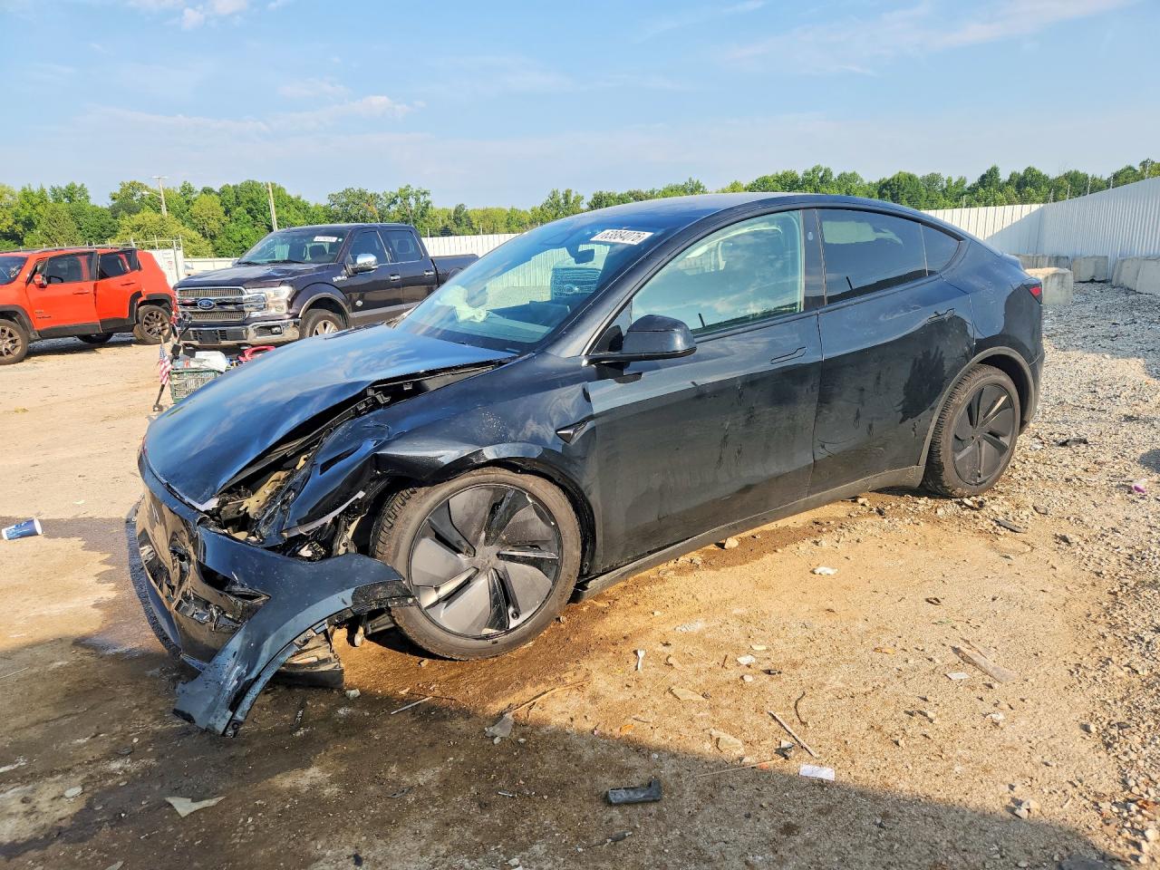 2026 TESLA MODEL Y — Front 3/4