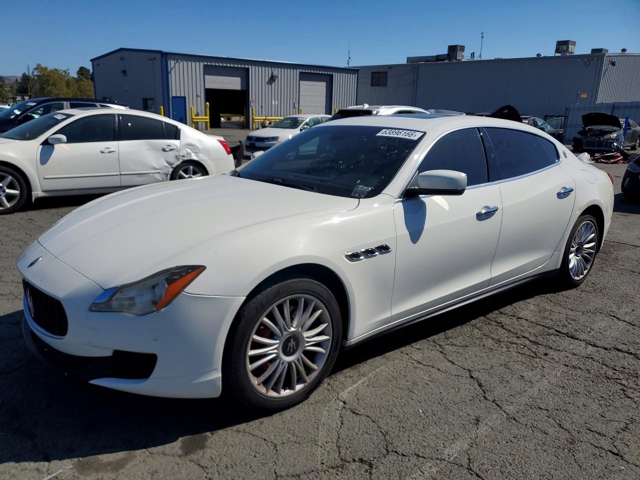 2014 MASERATI QUATTROPORTE Essence — Front 3/4