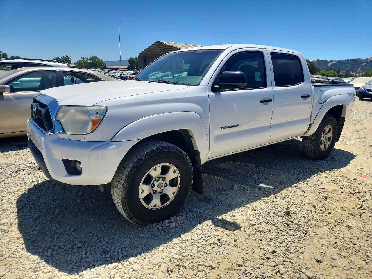 2013 TOYOTA TACOMA Delux — Front 3/4