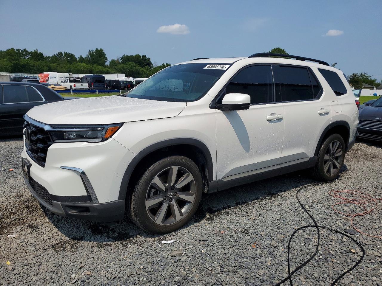 2025 HONDA PILOT TOURING, TOURING HPD — Front 3/4