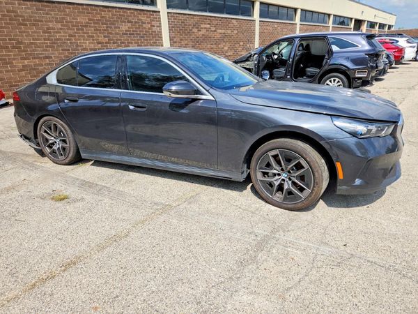 2025 BMW 530 xDrive — Passenger 3/4