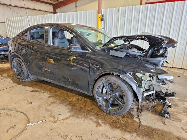 2026 TESLA MODEL Y — Passenger 3/4