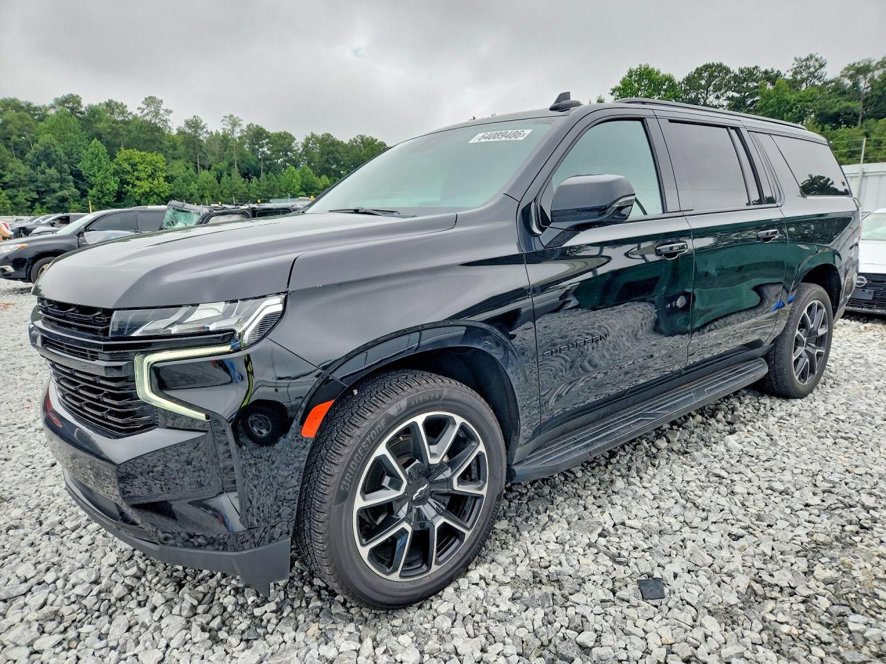 2023 CHEVROLET SUBURBAN RST — Front 3/4
