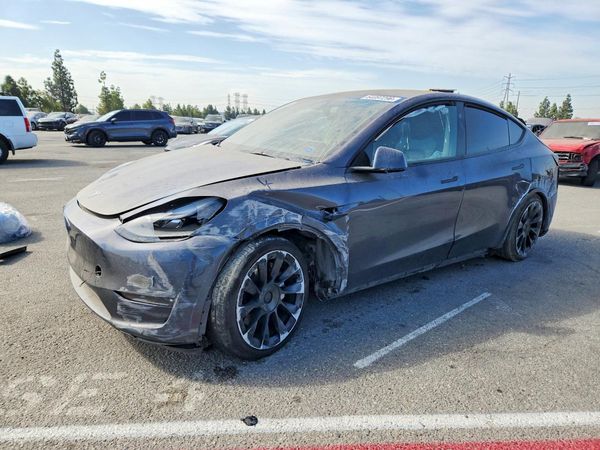 2023 TESLA MODEL Y — DSFA — Front 3/4