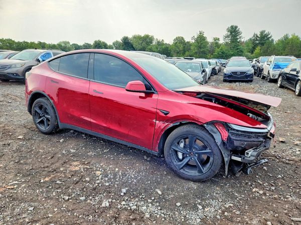 2026 TESLA MODEL Y — Passenger 3/4