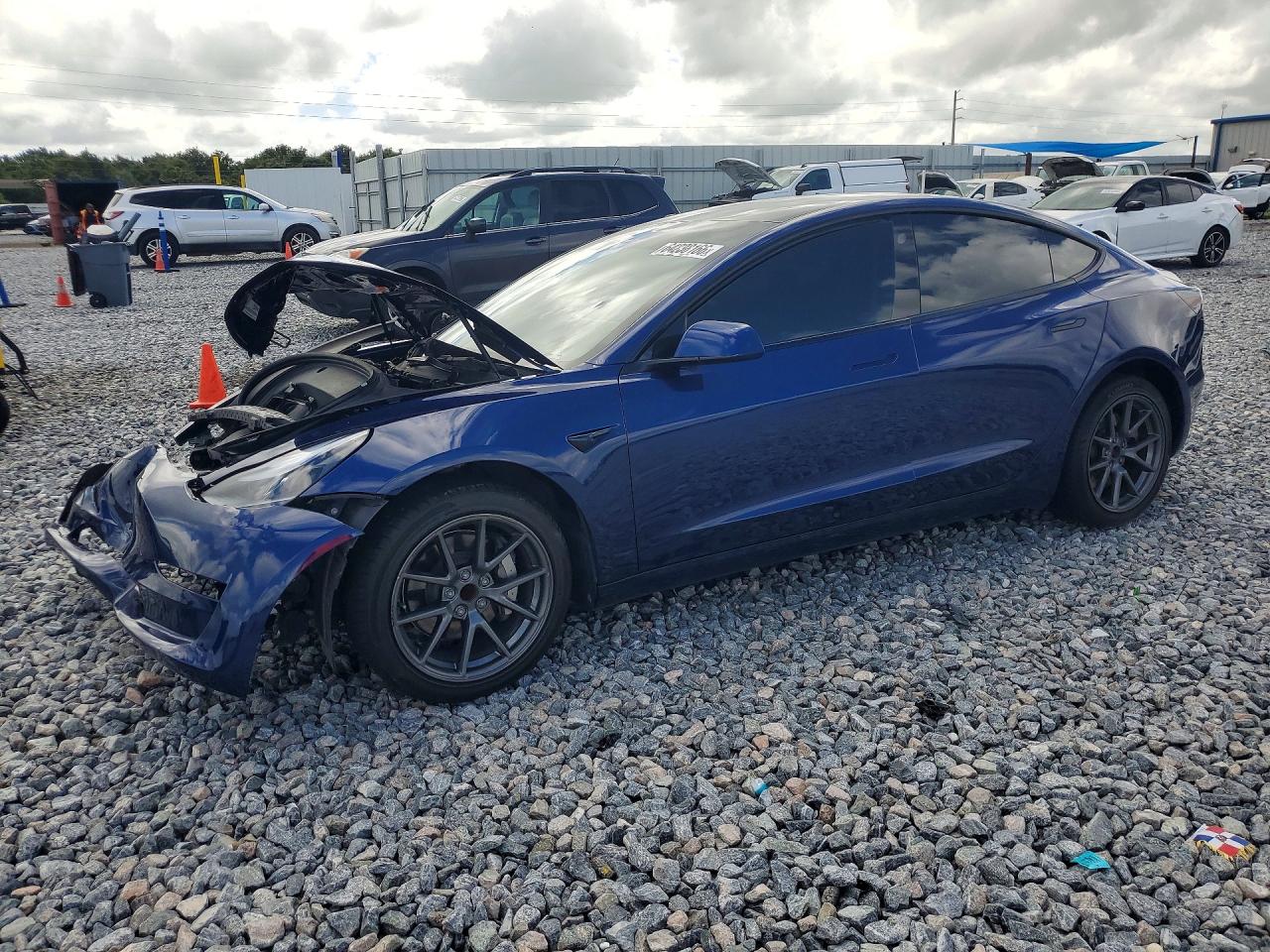 2023 TESLA MODEL 3 — Front 3/4