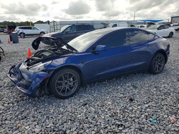 2023 TESLA MODEL 3 — Front 3/4
