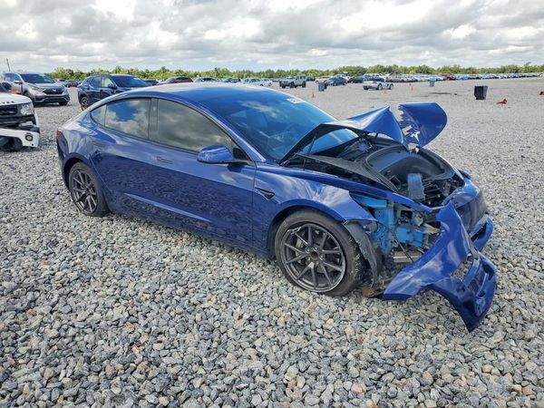2023 TESLA MODEL 3 — Passenger 3/4
