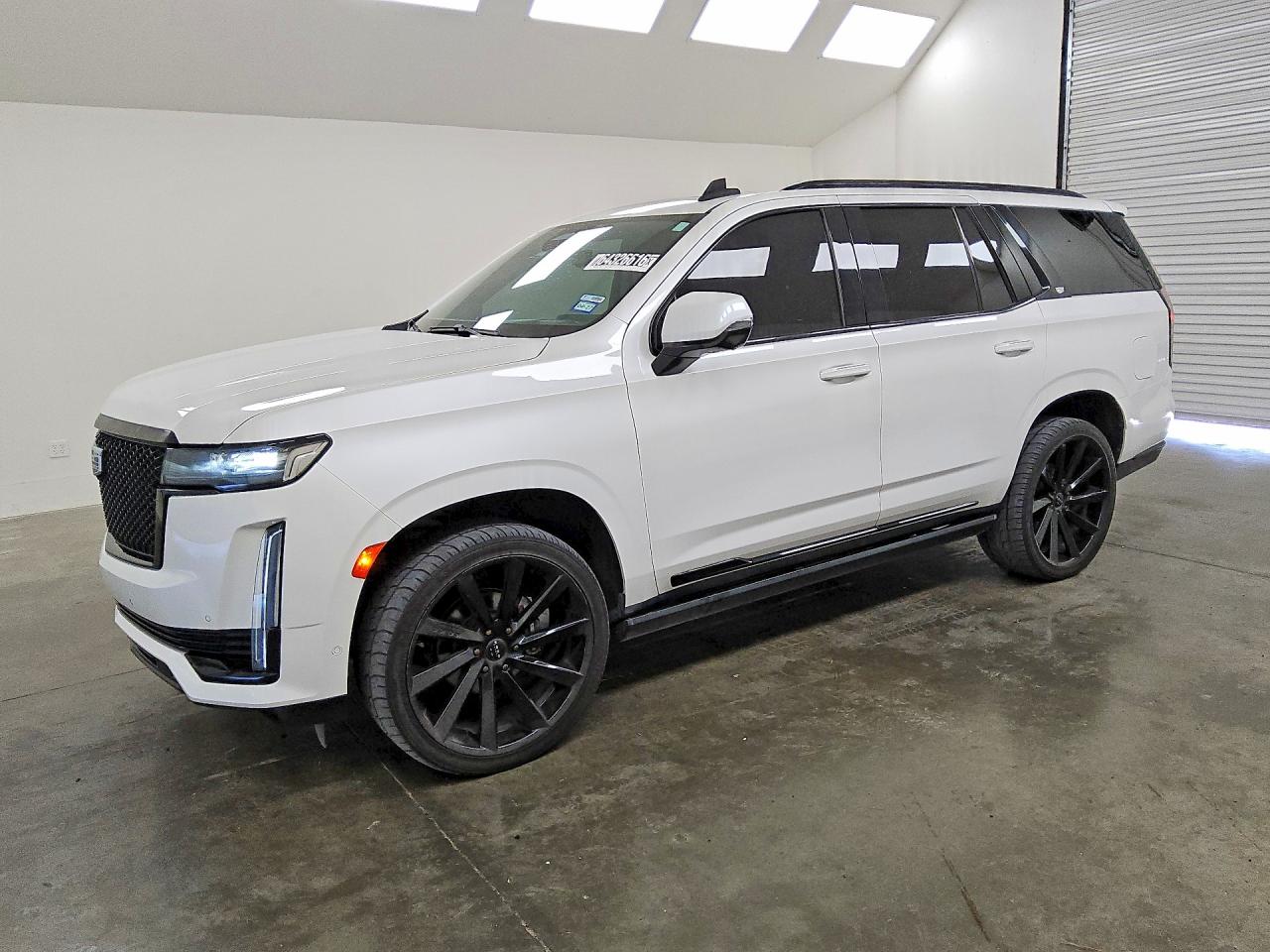 2021 CADILLAC ESCALADE Sport — Front 3/4