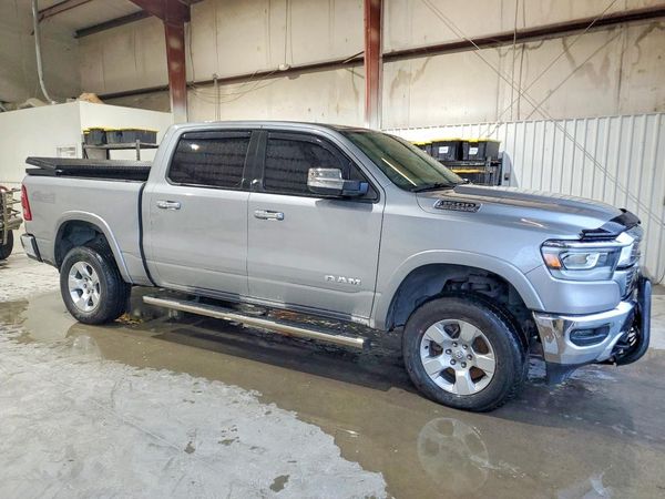 2019 RAM 1500 Laramie — Passenger 3/4