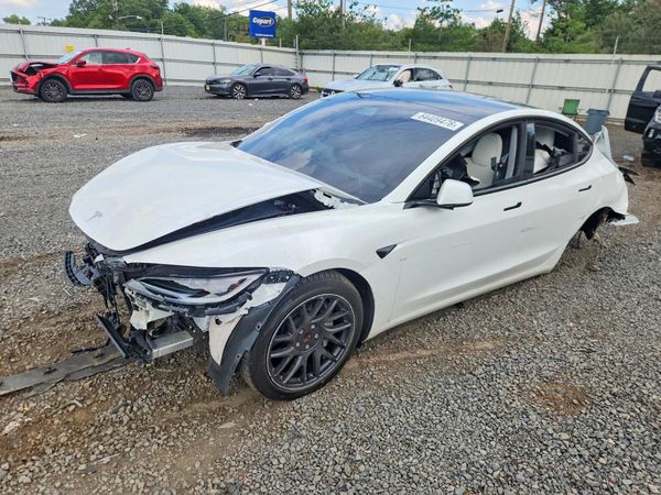 2025 TESLA MODEL 3 — Front 3/4