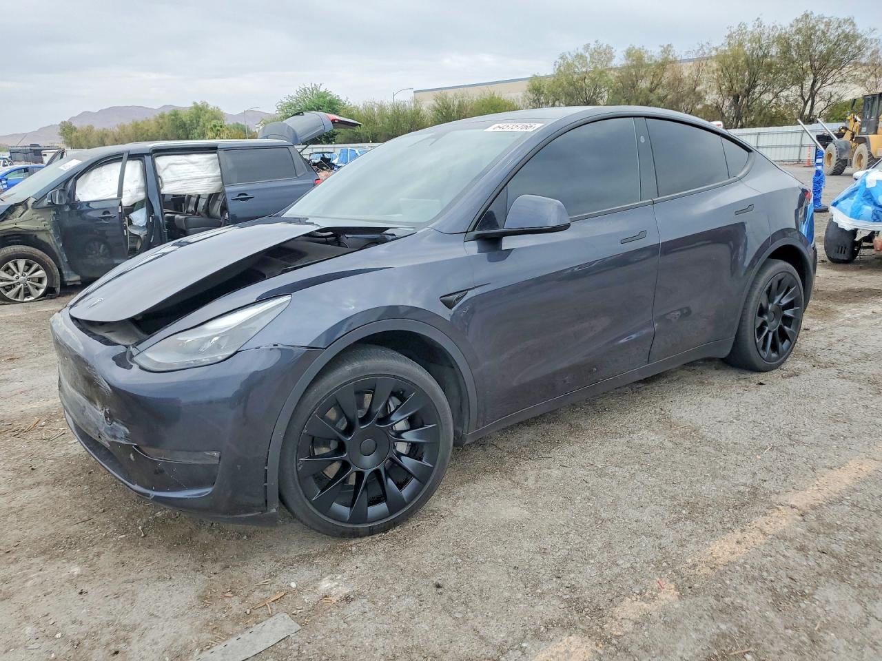 2024 TESLA MODEL Y — Front 3/4
