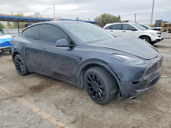 2024 TESLA MODEL Y — Passenger 3/4