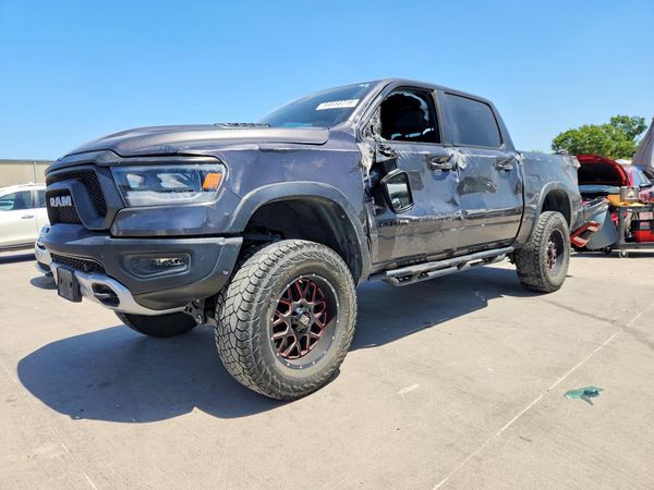 2019 RAM 1500 REBEL CREW CAB 4X4 — Front 3/4