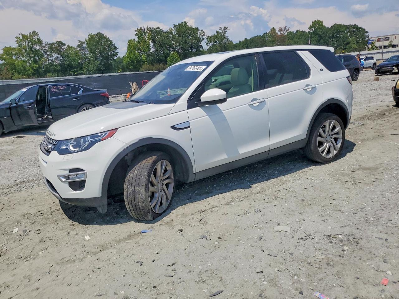 2019 LAND ROVER DISCOVERY HSE LUX — Front 3/4