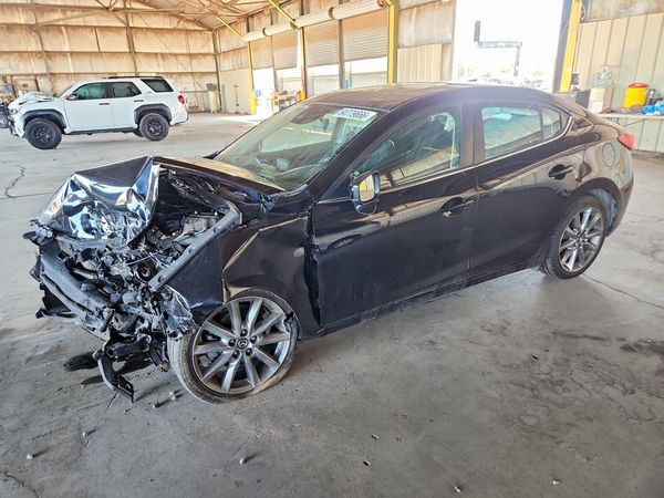 2018 MAZDA 3 Touring — Front 3/4