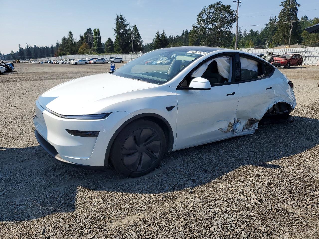 2026 TESLA MODEL Y — Front 3/4