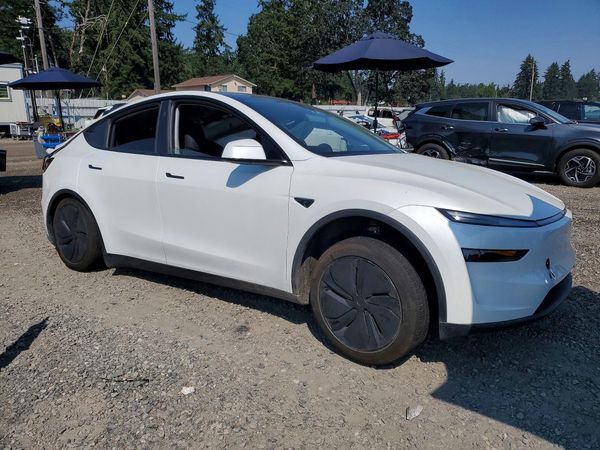2026 TESLA MODEL Y — Passenger 3/4