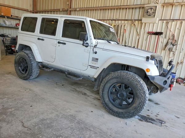 2012 JEEP WRANGLER U Sahara — Passenger 3/4