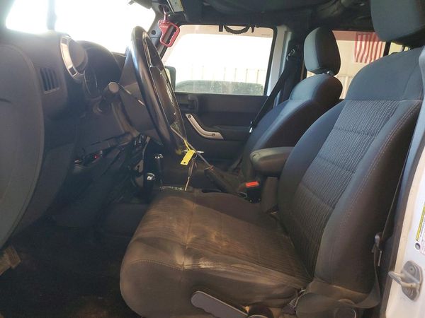 2012 JEEP WRANGLER U Sahara — DENT