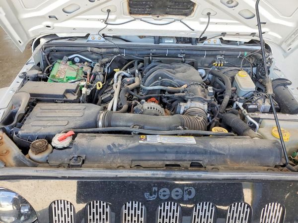 2012 JEEP WRANGLER U Sahara — Engine bay