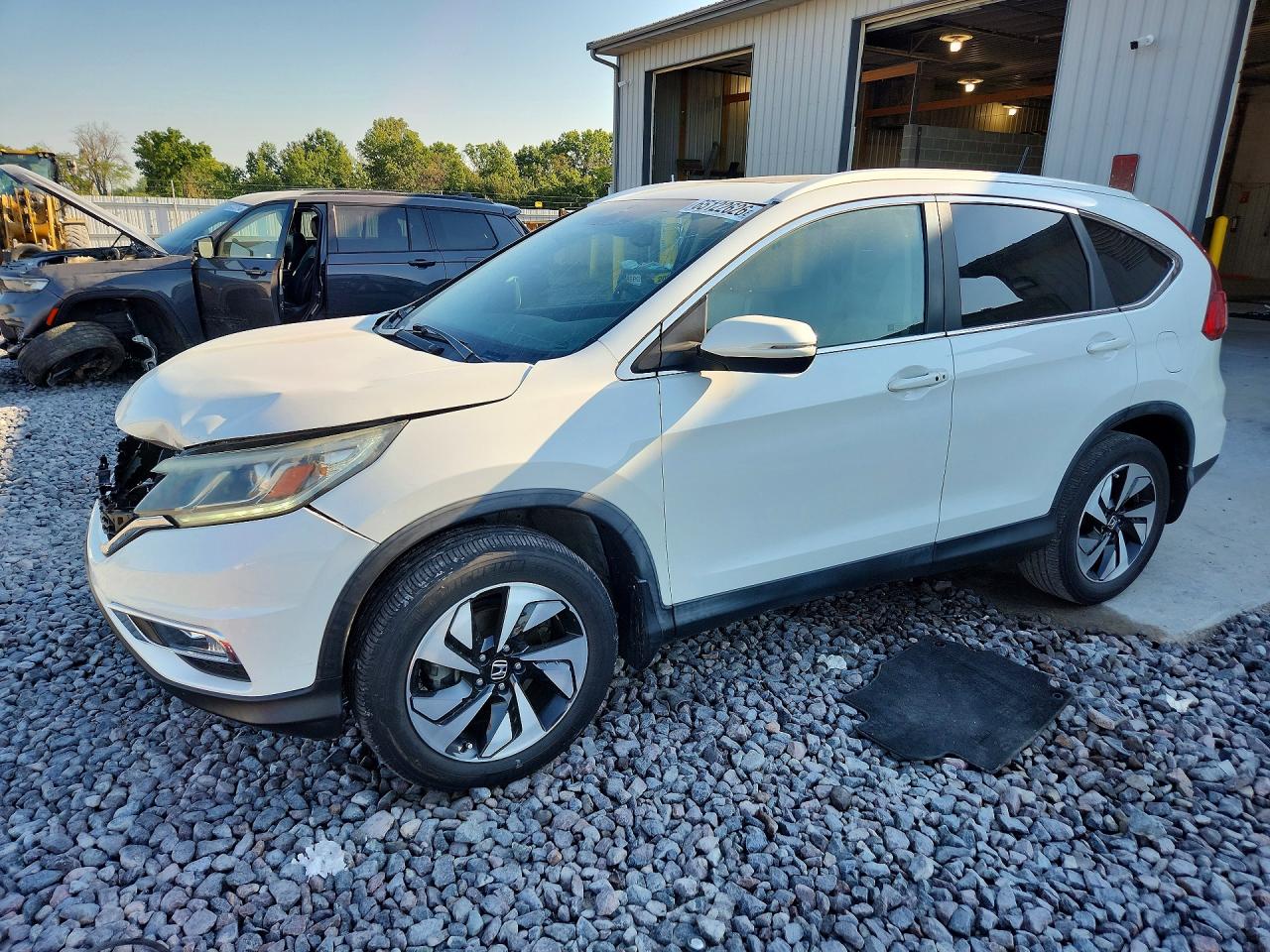 2016 HONDA CRV Touring — Front 3/4