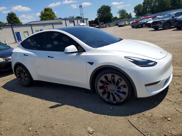 2023 TESLA MODEL Y — Passenger 3/4