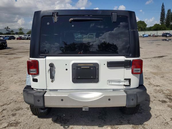 2014 JEEP WRANGLER Sahara — DIRR