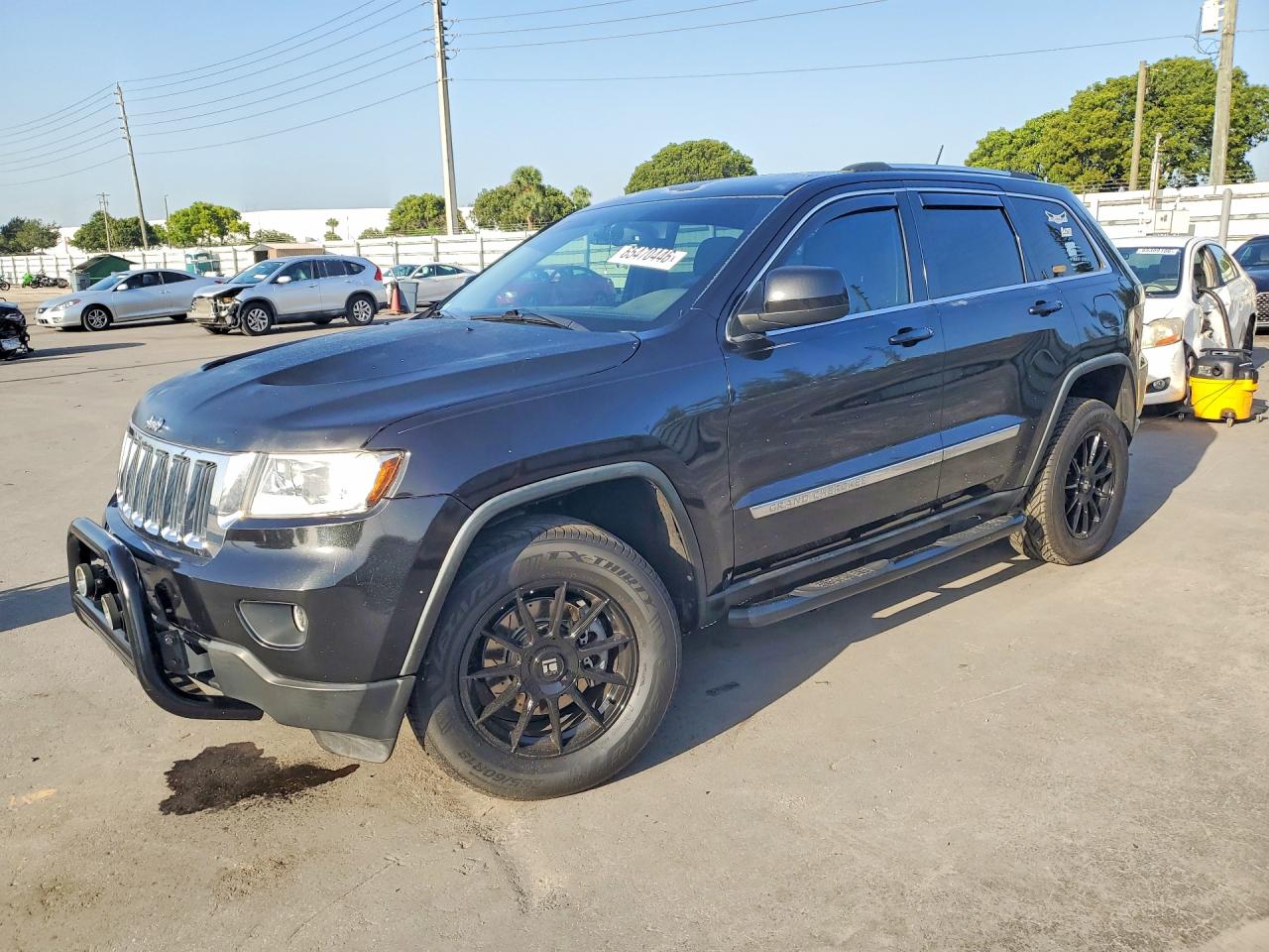 2012 JEEP GRAND CHER Laredo — Front 3/4