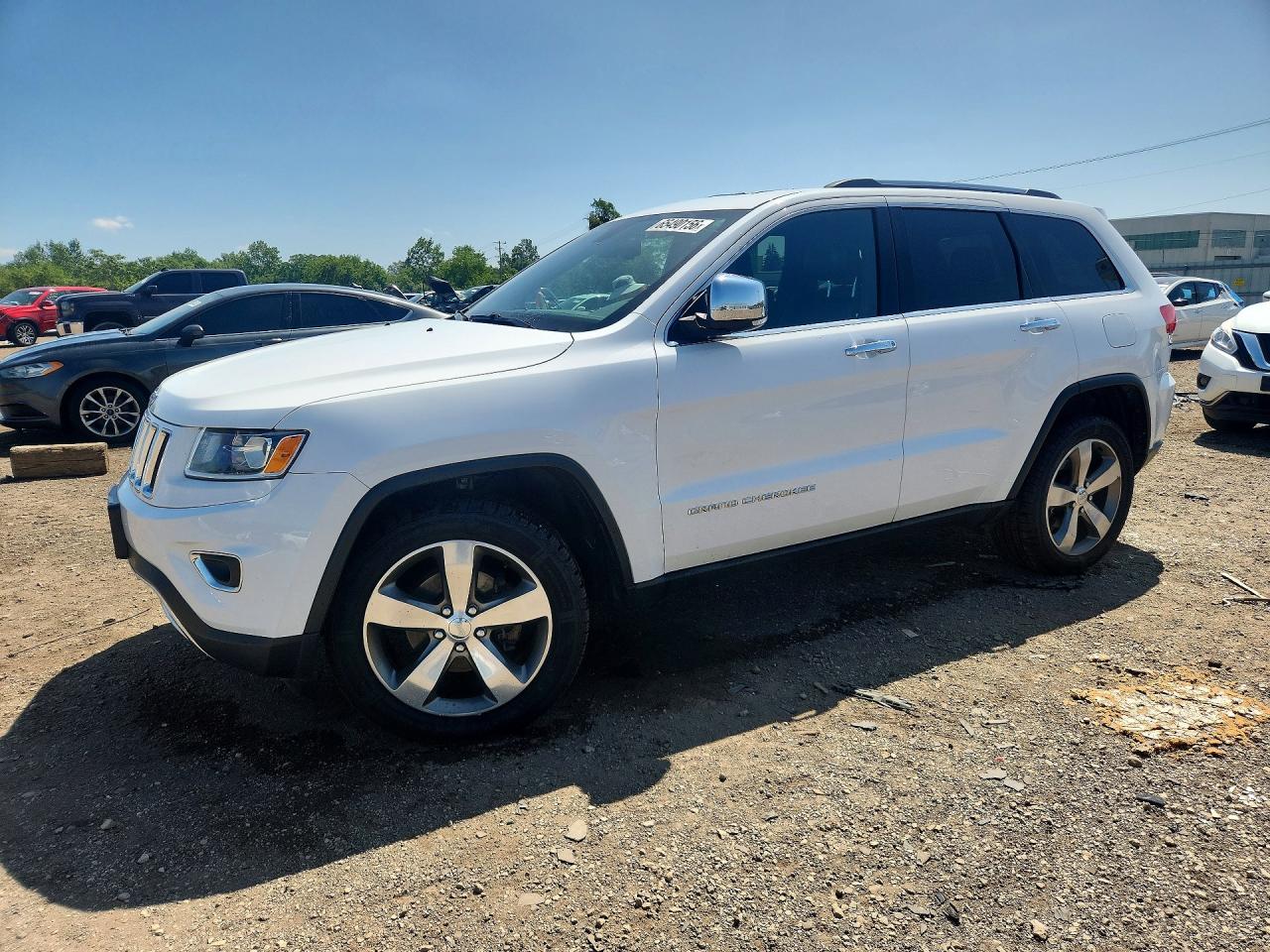 2016 JEEP GRAND CHEROKEE LIMITED 4X4 — Front 3/4