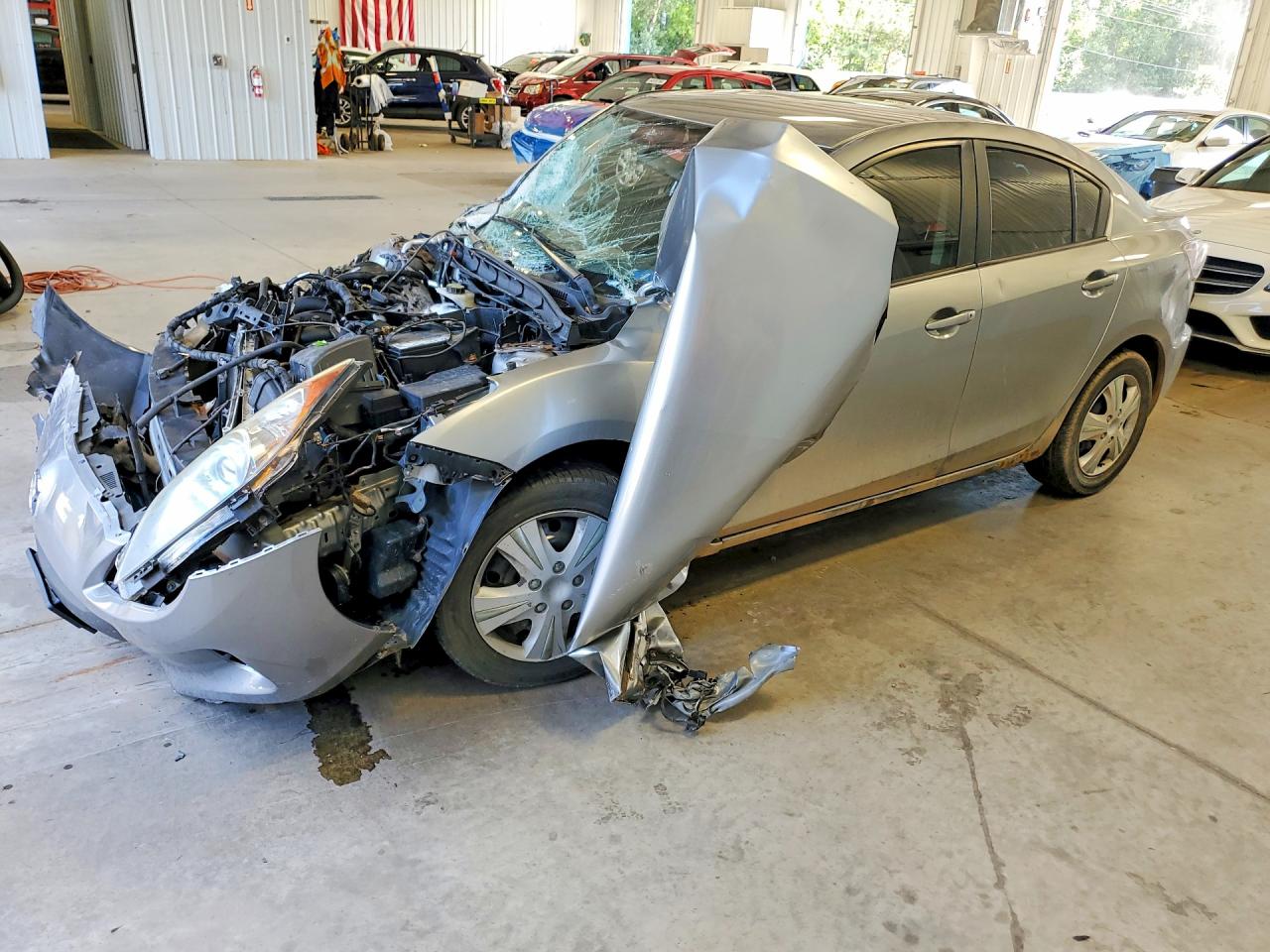 2012 MAZDA 3 Touring/GS — Front 3/4