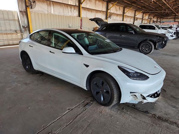 2023 TESLA MODEL 3 — Passenger 3/4