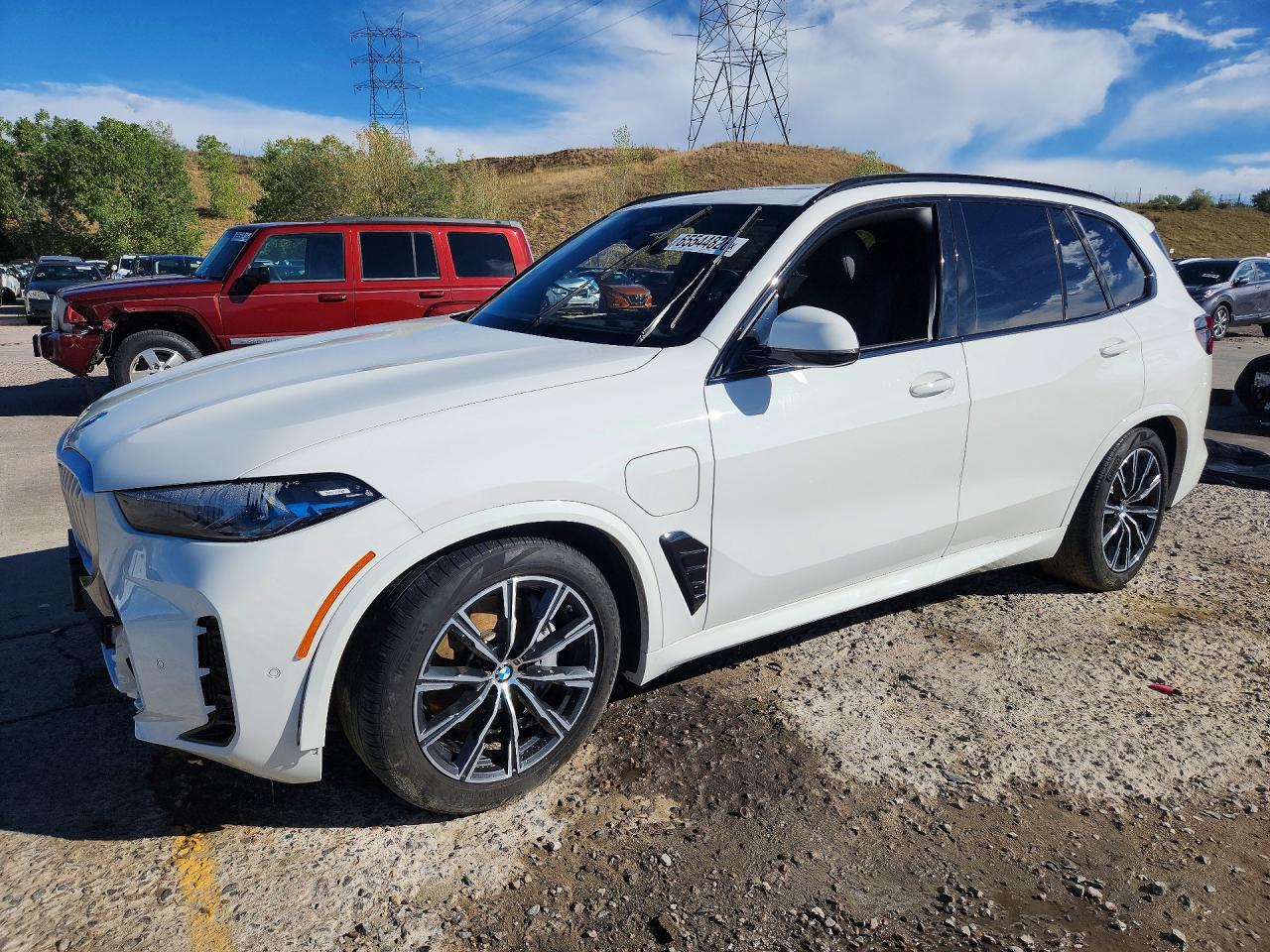 2026 BMW X5 xDrive50e — Front 3/4
