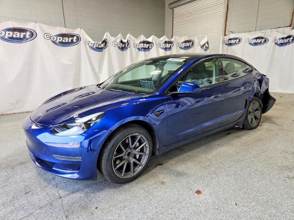 2022 TESLA MODEL 3 — Front 3/4